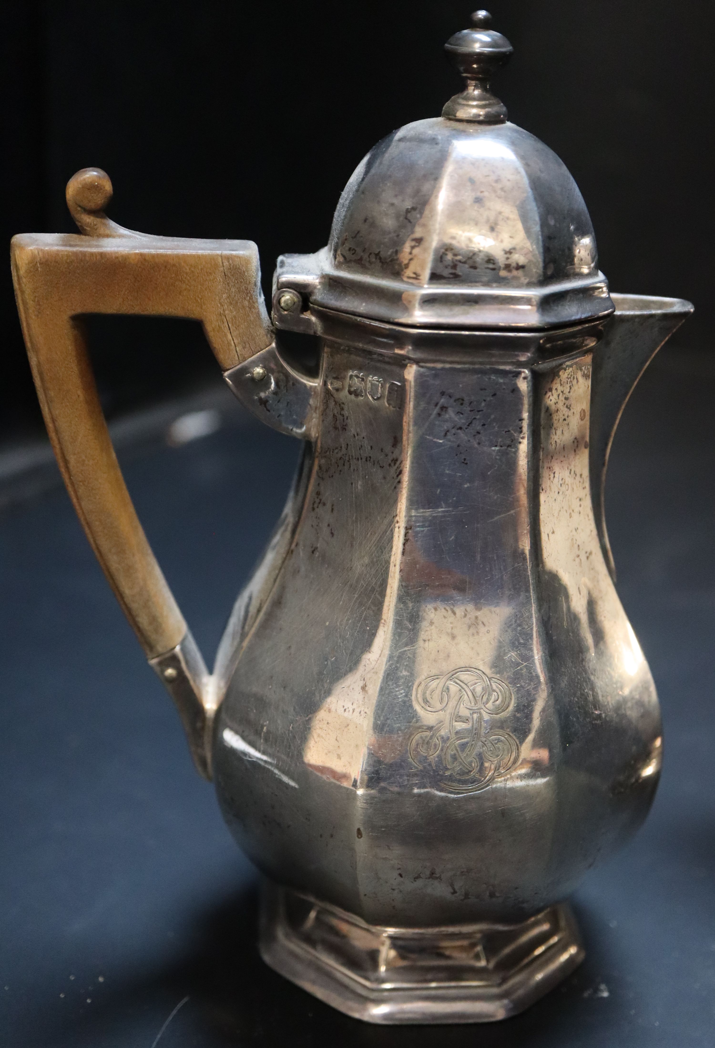 A pair of Edwardian silver café-au-lait pots, octagonal baluster bodies, monogrammed, Thomas Bradbury, London 1904